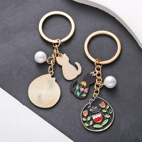 Süßer Schwarzer Katze Emaille Schlüsselanhänger Mit Künstliche Perle Blume Cartoon Tier Gold Metall Schlüsselring Für Damen