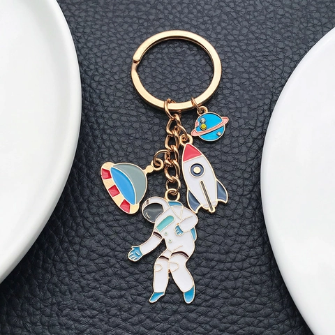 Portachiavi in Smalto Astronauta Razzo UFO Spazio Cartone Animato Lega di Zinco Placcato Oro Pendente per Borsa Regalo per Bambini Studenti
