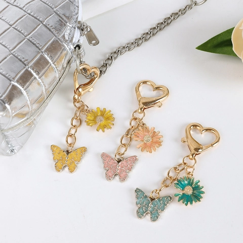 Llavero de Metal de Mariposa y Margarita Con Cierre de Corazón Colgante de Bolsa de Aleación de Zinc Creativo para Mujer