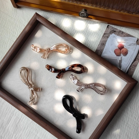 Eleganter Schleifenform Harz Banane Haarspange Für Damen Koreanischer Stil Rutschfeste Vertikale Haarnadel Lackiert Kunststoff Haarschmuck