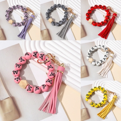 Portachiavi Bracciale Moda Perle di Legno Stampa Farfalla Con Nappina in Pelle Chiusura in Lega d'Oro per Donna Accessorio da Polso