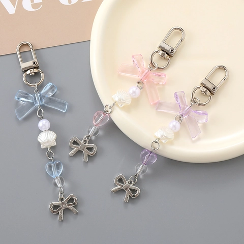 Llavero de Cuentas con Lazo Dulce para Mujer Colgante de Corazón y Concha de Acrílico Translúcido Joyería para Bolso