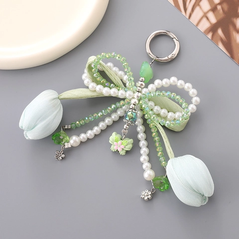 Llavero Colgante de Bolsa Tulipan de Perla Artificial Lazo de Satén para Mujer Fresa Cristal Mariposa Floral de Tela Accesorio
