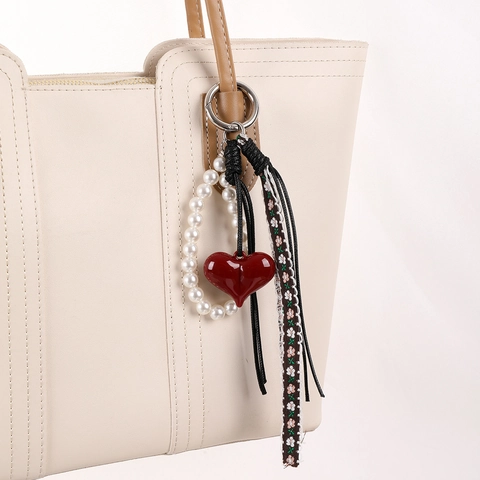 Ciondolo per Borsa a Cuore in Corda Intrecciata di Pelle Vintage per Donna Accessorio Pendente per Cellulare con Nappa