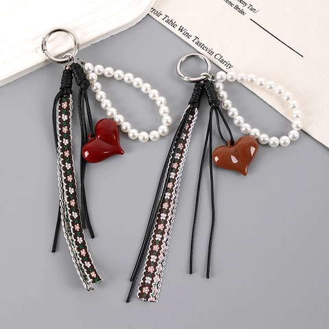 Ciondolo per Borsa a Cuore in Corda Intrecciata di Pelle Vintage per Donna Accessorio Pendente per Cellulare con Nappa