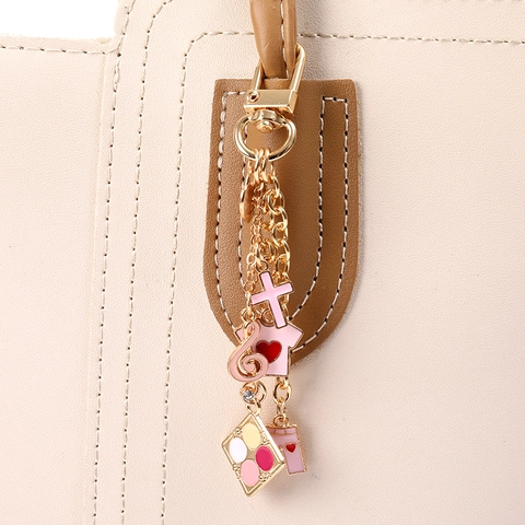 Portachiavi con Ciondolo per Borsa in Lega di Moda con Ciondoli a Forma di Coda di Sirena Conchiglia Nota Musicale Rossetto per Donna