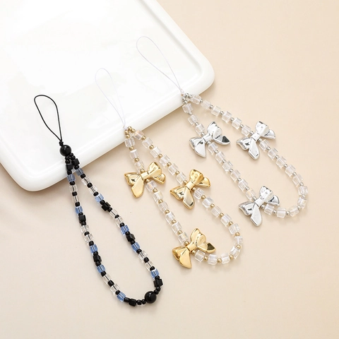 Lanière de Téléphone Perlée de Mode Dragonne Avec Charme de Nœud Cristal Cube Perles en Acrylique Chaîne de Téléphone Anti-Perte pour Femmes