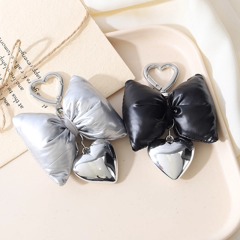 Chic Korean Alloy Faux Leather Bowknot Keychain With Metal Heart Pendant For Bag Decoration Phone Charm Women Gift