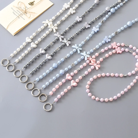 Artificial Pearl Crossbody Phone Lanyard Chain With Acrylic Bow Heart Pendant Handcrafted Anti-lost Phone Strap For Women Girls