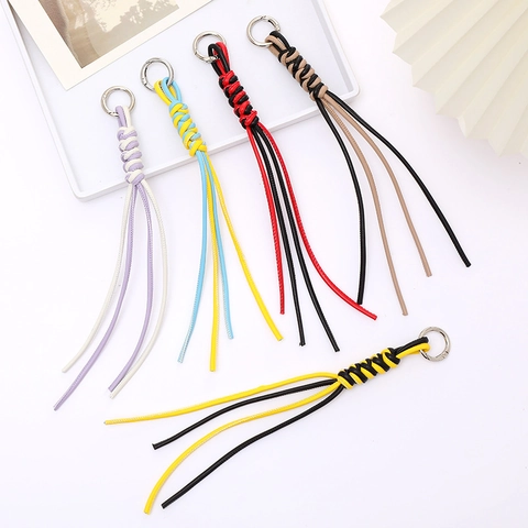 Hand Woven Synthetic Leather Keychain Two-Tone Spiral Knot Tassel Bag Charm Fashion Phone Lanyard Accessories For Men Women