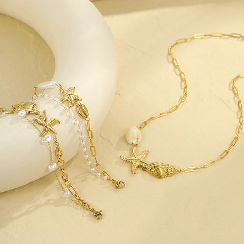 Ozean Stil Vergoldet Edelstahl Seestern Meerschnecke Anhänger Halskette Doppellagiges Künstliche Perlenarmband Set Für Damen Strand Schmuck