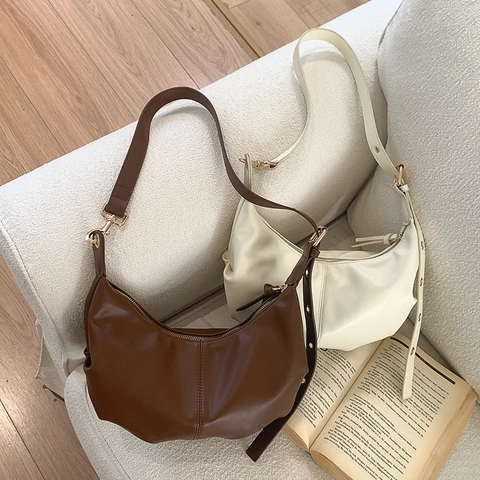 Sac à Épaule Hobo en Cuir PU pour Femmes Forme de Dumpling Minimaliste Sac Bandoulière Avec Sangle Réglable Rétro Sophistiqué Sac à Main Versatile