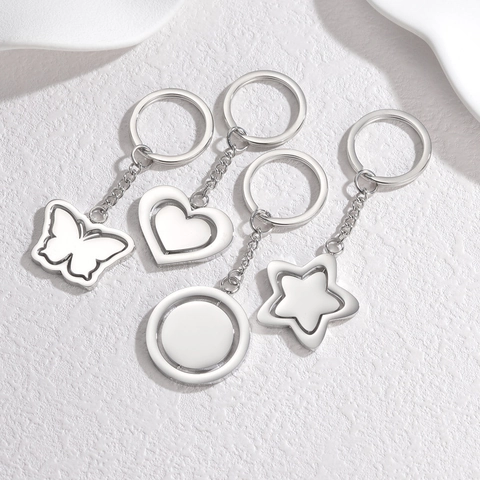 Portachiavi Geometrico in Acciaio Inossidabile Argento Stella Cuore Farfalla Ciondolo Tondo Portachiavi Arte Moderna Unisex