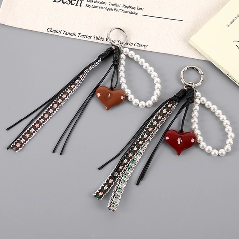 Vintage Herz Taschenanhänger Kunstperle Schleife Schlüsselanhänger Legierung Harz Handgewebt Blumenband Quaste Damen Zubehör