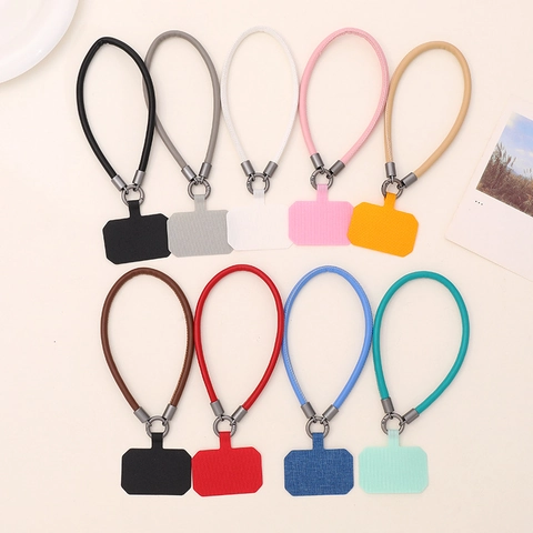 Dragonne de Poignet pour Téléphone en Cuir PU Minimaliste Anti-Perte Avec Anneau Métallique et Patch Pour Femmes Hommes Accessoires Téléphone