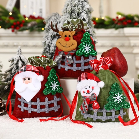 Weihnachtsgeschenktüten aus Jute Weihnachtsmann Rentier Schneemann Muster Kordelzug Süßigkeitenbeutel Für Weihnachtsfeiern Dekor