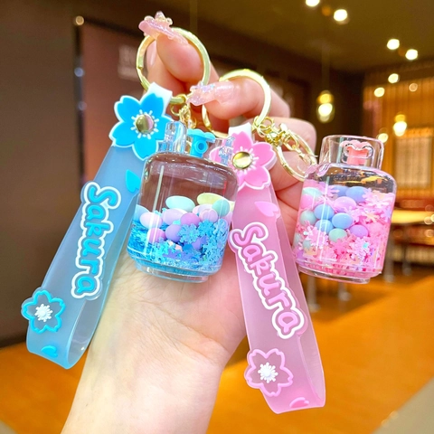 Cute Liquid Quicksand Keychain Sakura Snowflake Gas Tank Shape Acrylic Bag Pendant Charm Creative Gift For Women Girls