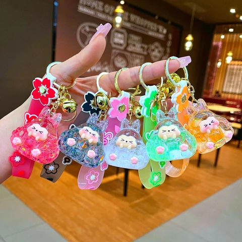 Portachiavi con Sabbia Mobile Luminosa Cartone Animato Animale Bottiglia di Olio Liquido Con Cinturino in Silicone Sakura