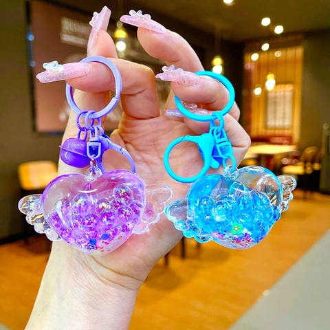 Acrylic Heart Wings Quicksand Keychain Glow In The Dark Drift Bottle Pendant With Bell For Women Bag Hanging Accessories