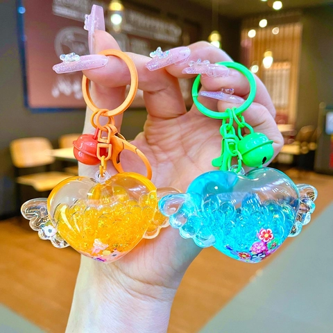 Acrylic Heart Wings Quicksand Keychain Glow In The Dark Drift Bottle Pendant With Bell For Women Bag Hanging Accessories