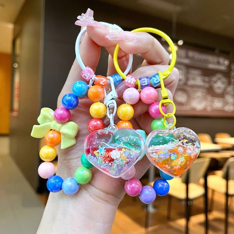 Porte-clés Créatif en Sables Mouvants Cœur Perlé Dégradé Pendentif de Sac en Acrylique Avec Nœud et Perles Alphabet pour Femmes