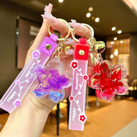 Portachiavi Creativo in Acrilico con Fiori Secchi di Ciliegio con Sabbie Mobili Liquide Ciondolo a Fiore Luminoso Campanello Cinturino per Borsa Auto Chiave Ciondolo Regalo
