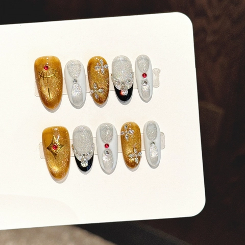 Handmade Press On Nails Luxury Amber Gold Cat Eye Rhinestone 3D Bow Star Decoration Medium Oval Artificial Nails For Women