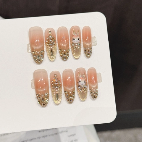 Unghie Finte Fatte A Mano Sfumatura Rosa Occhio Di Gatto Con Coniglio 3D Strass Perla Artificial Forma Di Mandorla Set Per Donna