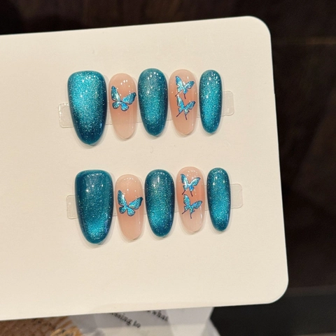 Uñas Postizas de Cristal Azul Mariposa Ojo de Gato Azul Pavo Real Brillo Uñas Postizas Elegante Decoración Mariposa Irisada