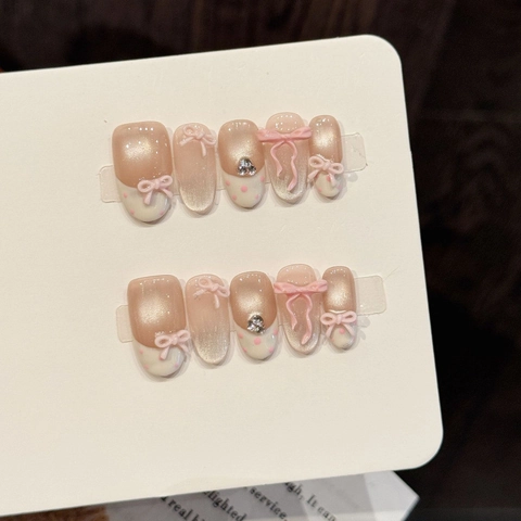 Unghie Finte a Pressione Occhio di Gatto Sfumate Rosa Fatte a Mano Con Decorazione Fiocco e Strass per Donna Set Manicure