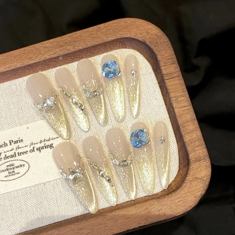 Luxe Handgemaakte Kattenoog Press On Nagels Lange Stiletto Champagne Goud Gradiënt Blauwe Strass Glitter Kunstnagels