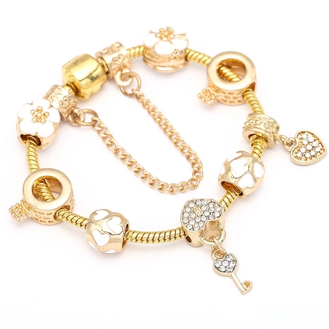 Elegante Pulsera De Dijes De Aleación Bañada En Oro Para Mujer Colgante De Llave De Corazón Y Flores De Esmalte Blanco Joyería
