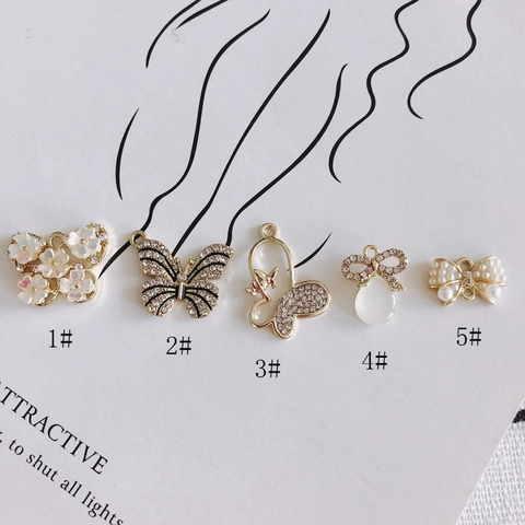 Ciondoli Farfalla Fiocco in Lega Strass Perla Artificial Per Creazione di Gioielli Pendenti DIY Per Orecchini Collana Bracciale Artigianato