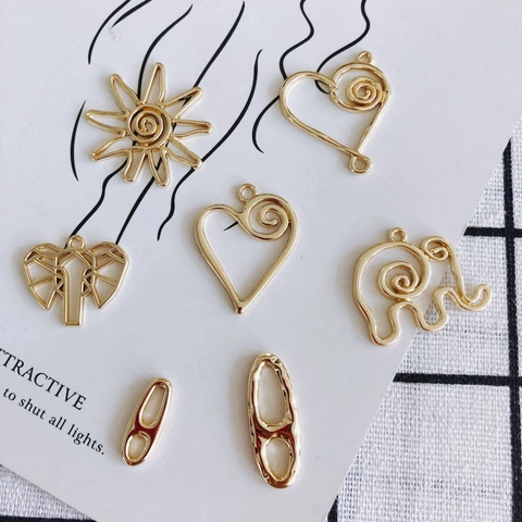 Alloy Gegalvaniseerde DIY Sieraden Accessoires Olifant Zon Hartvormige Hangers Goud Bedeltjes Voor Ketting Armband Maken DIY Materialen