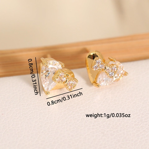 Orecchini a Bottone con Cuore e Fiocco in Zirconia Design di Nicchia per Donna Rame Placcato Oro 18K Dolce Elegante