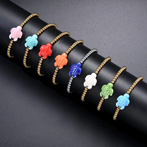 Ocean Style Stainless Steel Beaded Bracelet with Ceramic Turtle Charm Gold Silver Plated Elastic Stretch Bracelet for Women