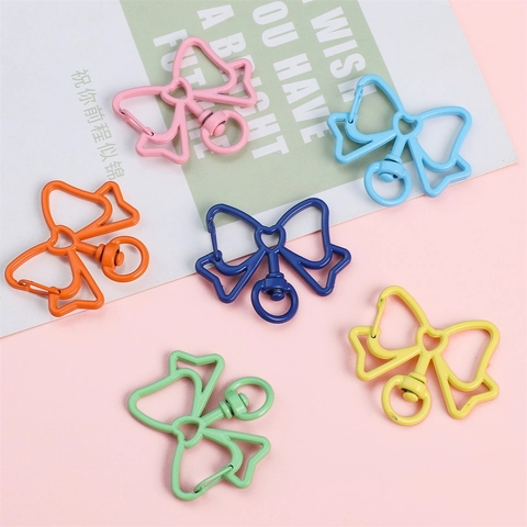 Crochet de Porte-clés Pivotant avec Fermoir Mousqueton en Forme de Cœur et Nœud en Métal Accessoires de Porte-clés en Alliage Couleur Bonbon
