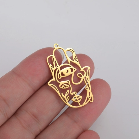 Pendenti a Forma di Mano di Hamsa con Viso Astratto in Acciaio Inossidabile Occhio Traforato Accessori per Gioielli Fai da Te