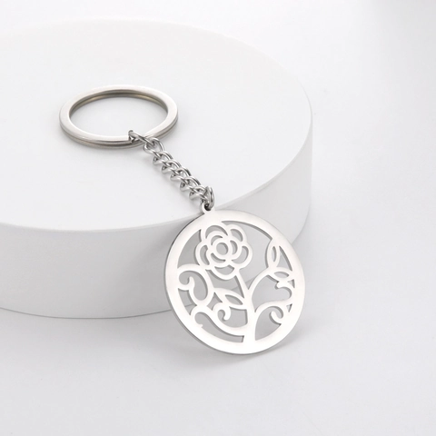 Porte-clés minimaliste en acier inoxydable avec pendentif fleur de rose ronde ajourée Motif de feuille botanique argenté
