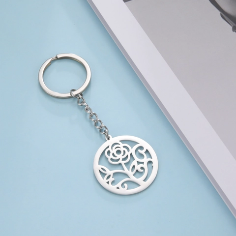 Porte-clés minimaliste en acier inoxydable avec pendentif fleur de rose ronde ajourée Motif de feuille botanique argenté