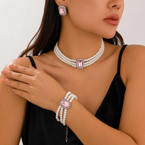 Set di Gioielli Vintage con Künstliche Perle Sintetiche Multistrato Collana Bracciale Orecchini a Bottone Lega Strass Elegante Festa Donna