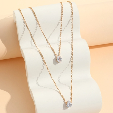 Collier Double Couche Or Alliage De Cuivre Avec Pendentifs En Zircone Cubique Poire Et Ovale Bijoux Minimalistes