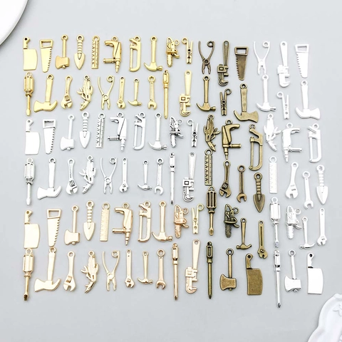 Pendentifs Mini Outils en Alliage de Zinc Mixtes 100pcs Or Argent Bronze Marteau Clé Scie DIY Bijoux Accessoires