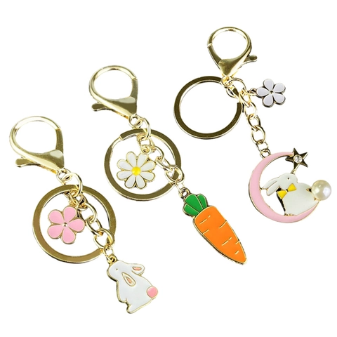 Simpatico Portachiavi di Pasqua a Forma di Coniglio in Lega Placcata Oro Smalto Carota Margherita Luna Stella Perla Artificial Pendente Borsa Regalo Donna