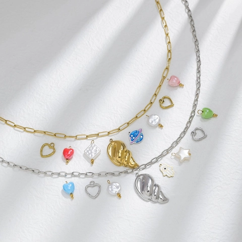 Pendentifs en Acier Inoxydable 304 Plaqué Or 18K Conque Cœur Planète Main de Fatma Œil pour Création de Bijoux DIY