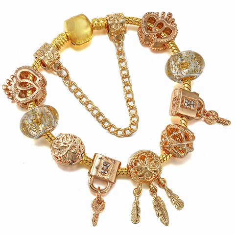 Bracciale Charm DIY in Lega Color Oro Moda Ciondolo Acchiappasogni Cuore Corona Perla di Vetro Foglia Oro Gioielli