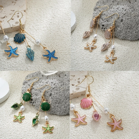 Boucles d'oreilles en forme de conque