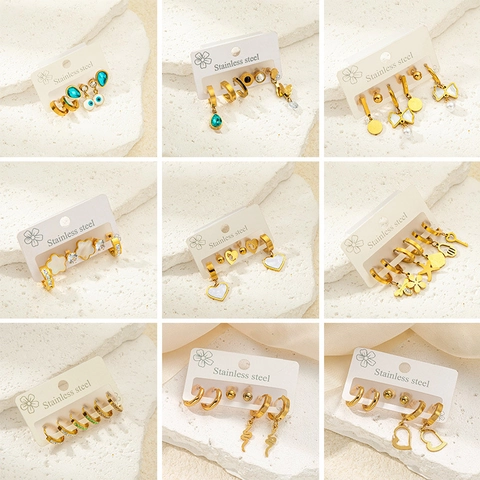 Luxueux Boucles d'Oreilles en Acier au Titane Ensemble Strass Nœud Papillon Cœur Papillon Breloques Bijoux de Mode Femme Cadeau
