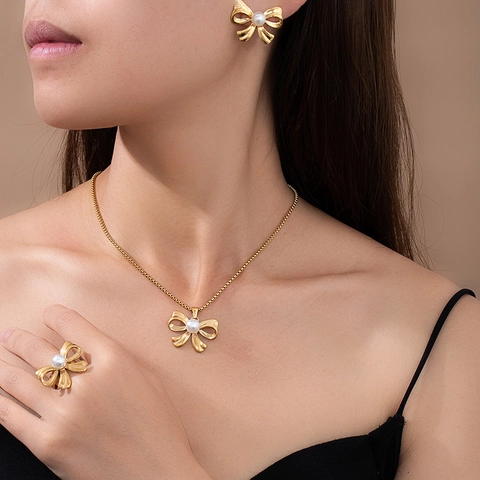 Set di Gioielli in Acciaio Inossidabile con Künstliche Perle Fiocco Fiore Ali per Donna Collana Orecchini Anello Placcato Oro Gioielli Moda