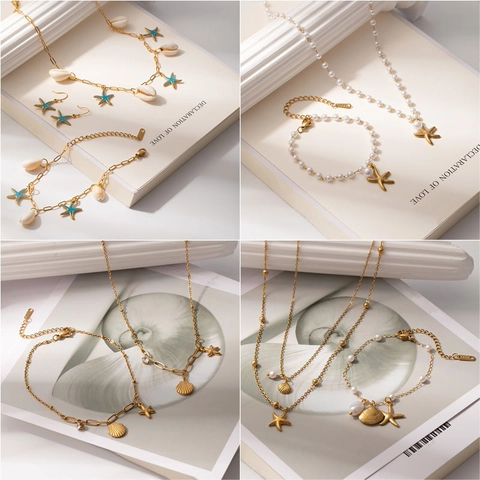 Set di Gioielli in Acciaio al Titanio Placcato Oro Stella Marina Conchiglia Perla Artificiale per Donna Collana con Pendente Delfino Bracciale Orecchini Accessori Moda Mare